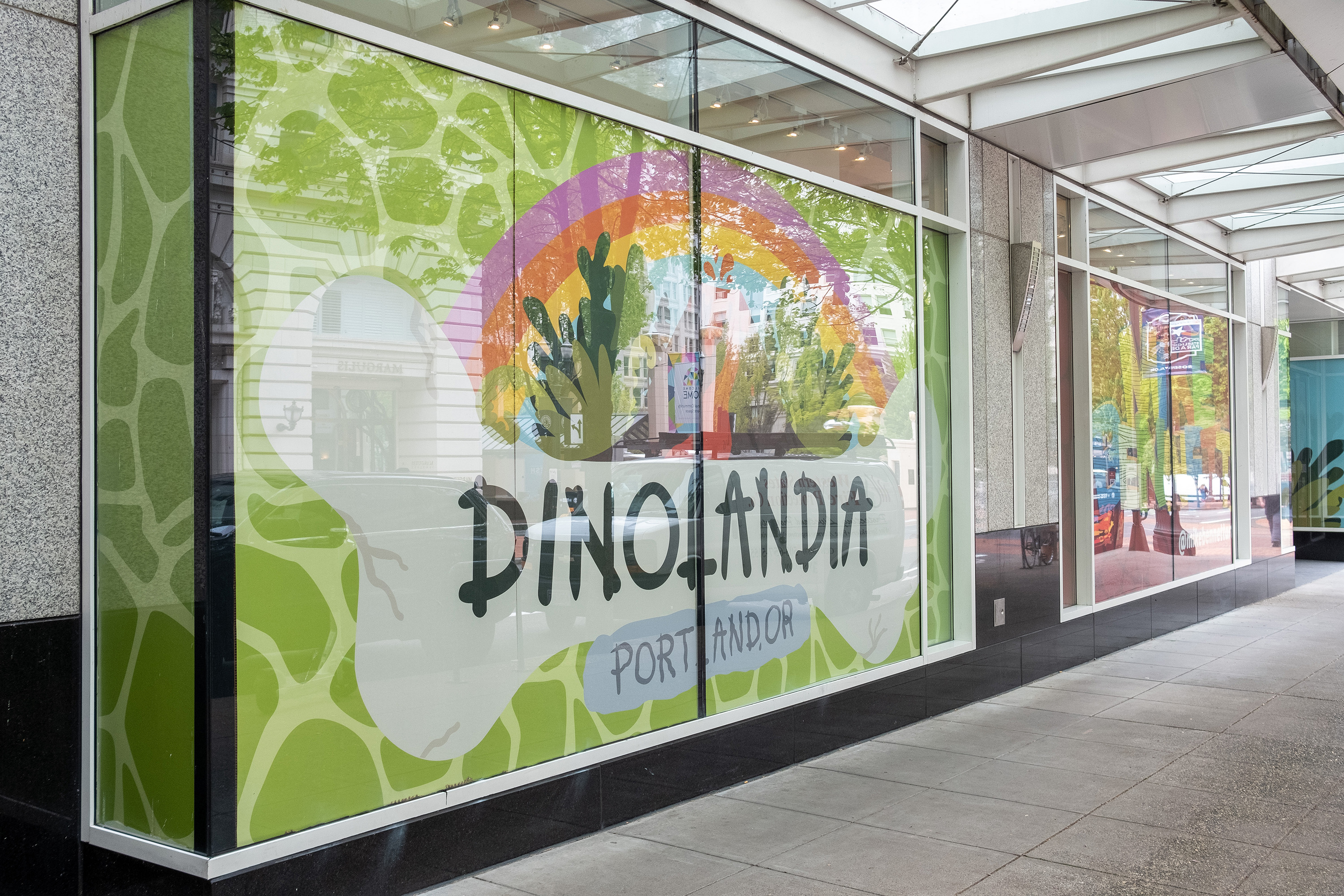Dinolandia window graphics produced by Infinity Images.